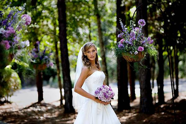 bride with purple bouquet