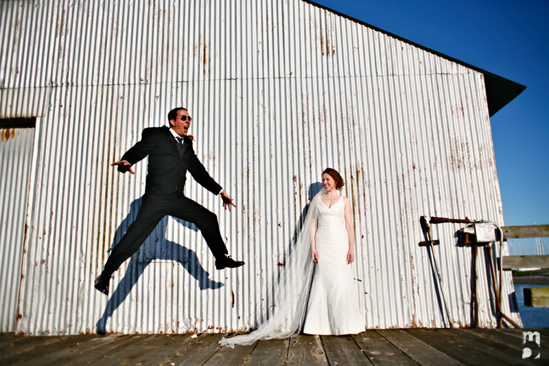 groom jumping portrait