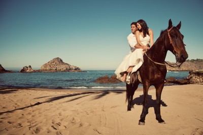 bride-and-groom-horseback-on-the-beach-2