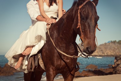 bride-and-groom-horseback-on-the-beach-3