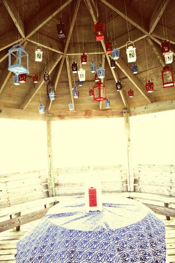 lanterns hung from barn roof