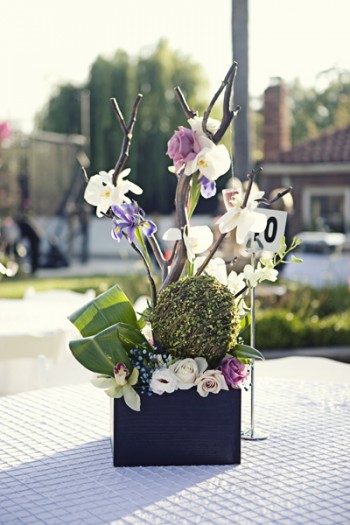 purple and green modern branch centerpieces