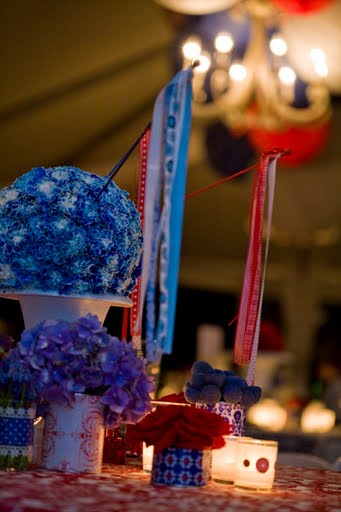 blue and red centerpieces with pomanders and covered tin can centerpieces