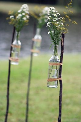 glass-jars-tied-to-sticks