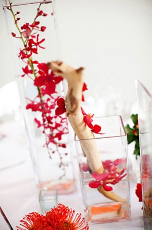 modern-red-branch-centerpiece-submerged-flowers