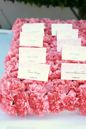 pink-carnation-escort-card-bed