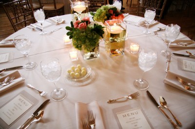pink white and green tablescape with plexiglass menu cards