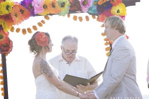 Wedding Under Colorful Tissue Paper Arch