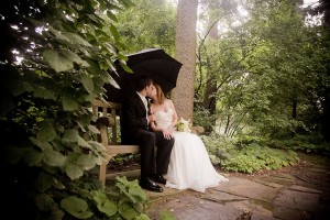 bride-and-groom-under-umbrella