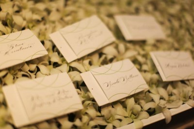 calligraphy-escort-cards-on-a-bed-of-orchids