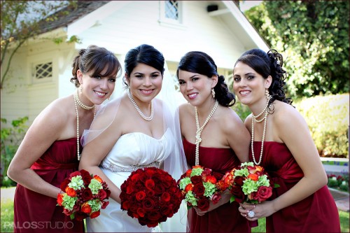red-bridal-bouquet-contrasting-bridesmaids