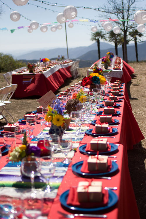 red-blue-multicolored-mexican-fiesta-wedding-table-centerpiece-papel-picado-banners