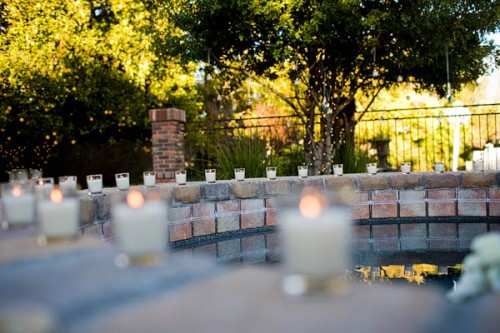 backyard-wedding-pool-surrounded-by-candles