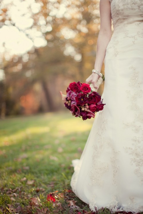 bride-with-raspberry-red-bouquet