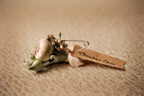Pink and Green Ranunculus Boutonniere
