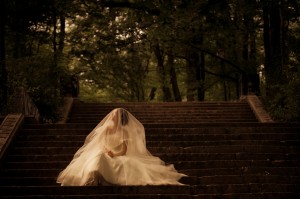 Bride Sitting on Steps