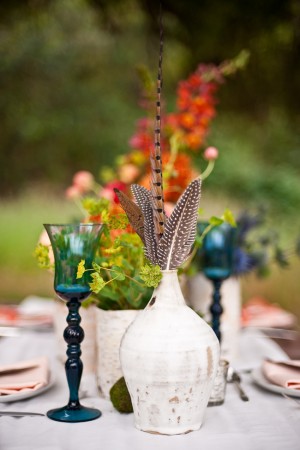 Gypsy-Wedding-Ideas-Blue-Goblets-and-Feather-Centerpieces