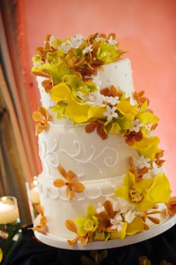 Wedding-Cake-with-Yellow-and-Orange-Orchids