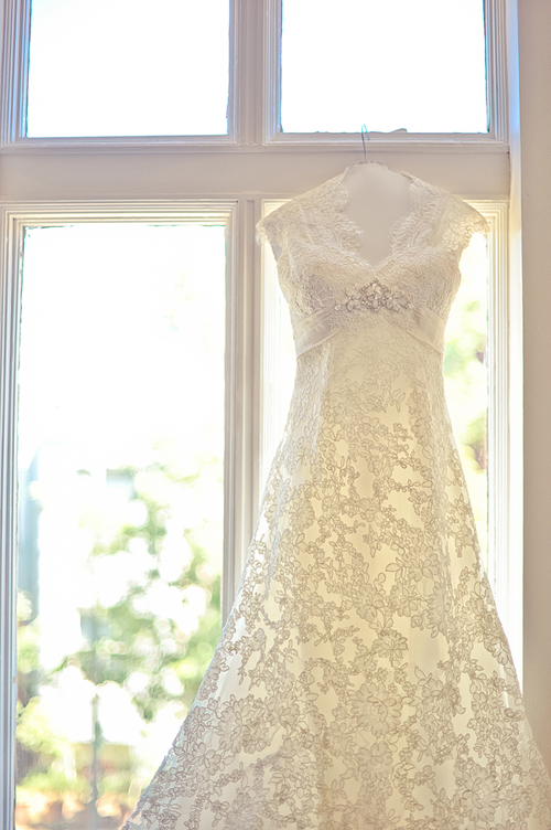 Hanging-Wedding-Gown-in-Window