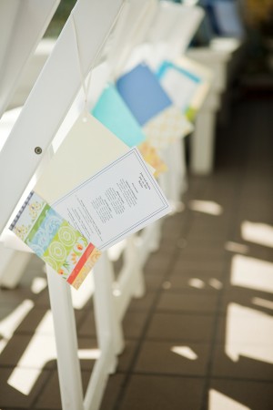 Wedding-Programs-Hanging-from-Chairs