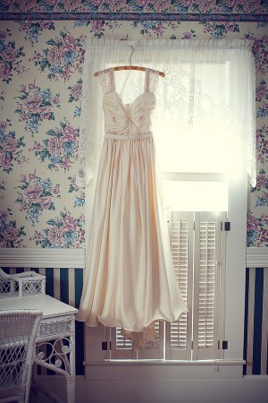 Bride-Gown-Hanging-in-Blue-Room