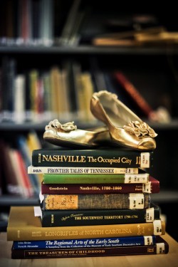 ballet-flats-on-stacked-books