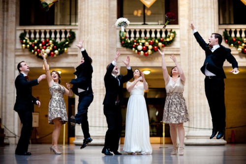 bridal-party-throwing-flowers-in-the-air