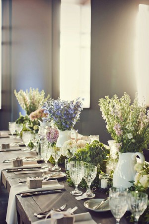 Colorful-Centerpieces-in-White-Pitcher-Vases