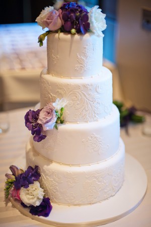 Elegant-White-Wedding-Cake-with-Purple-Flowers