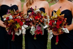 Bridesmaids Bouquets With Roses Berries and Leaves