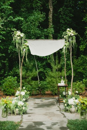 Chuppah With Branches and White and Green Flowers