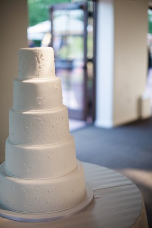 Elegant Five Tier Round Wedding Cake With White Detailing