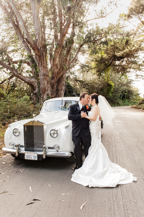 Bride and Groom With White Rolls Royce 1