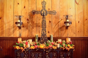 Fall Altar Arrangement With Flowers Candles and Pumpkins