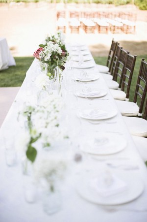 Long White Outdoor Reception Table With Bamboo Chairs