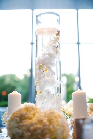 Orchids In Tall Vase Centerpiece