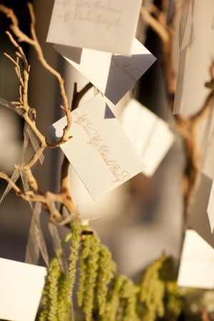 Reception Place Cards on Branches With Moss