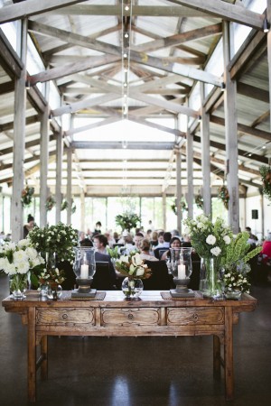 Reception Table With White and Green Arrangements
