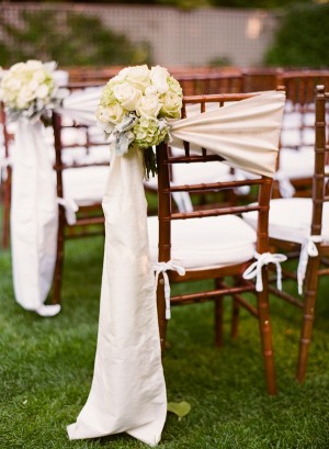 Silk Wrap on Ceremony Chairs With Rose and Hydrangea Bouquet