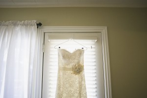 Strapless Lace Covered Bridal Gown With Ribbon and Flower Sash