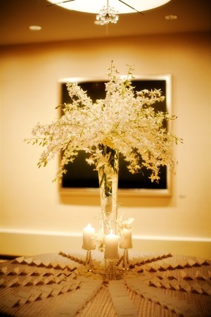 Tall White Floral Arrangement With Candles and Place Cards