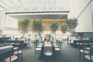 Black Reception Tables With Orange Chevron Striped Runners