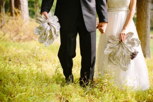 Bride and Groom Holding Cabbage Leaves