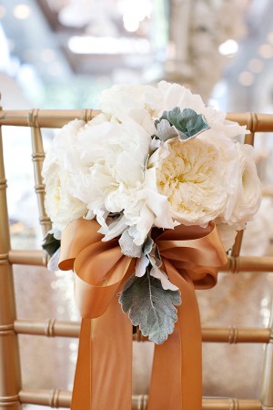 Floral Chair Decor With Brown Ribbon Bow