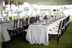 Harborside Rehearsal Dinner Tables With Striped Tablecloths