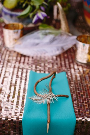 Turquoise Napkin on Metallic Tablecloth