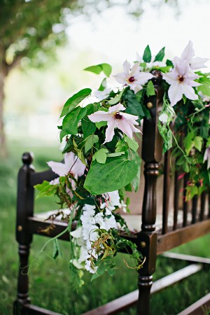 White Flowers and Greenery Garland on Bench1