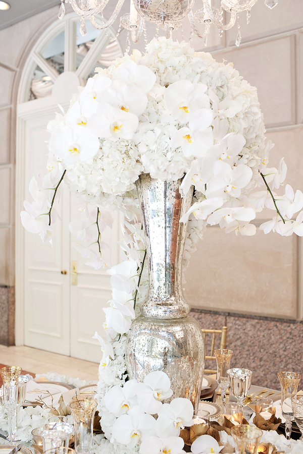 White Orchids and Hydrangeas in Tall Silver Vase