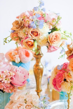 Blue Pink Peach and Cream Flowers in Gold Candlestick Vase