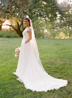 Elegant Wedding Gown With Lace Sleeves and Pockets
